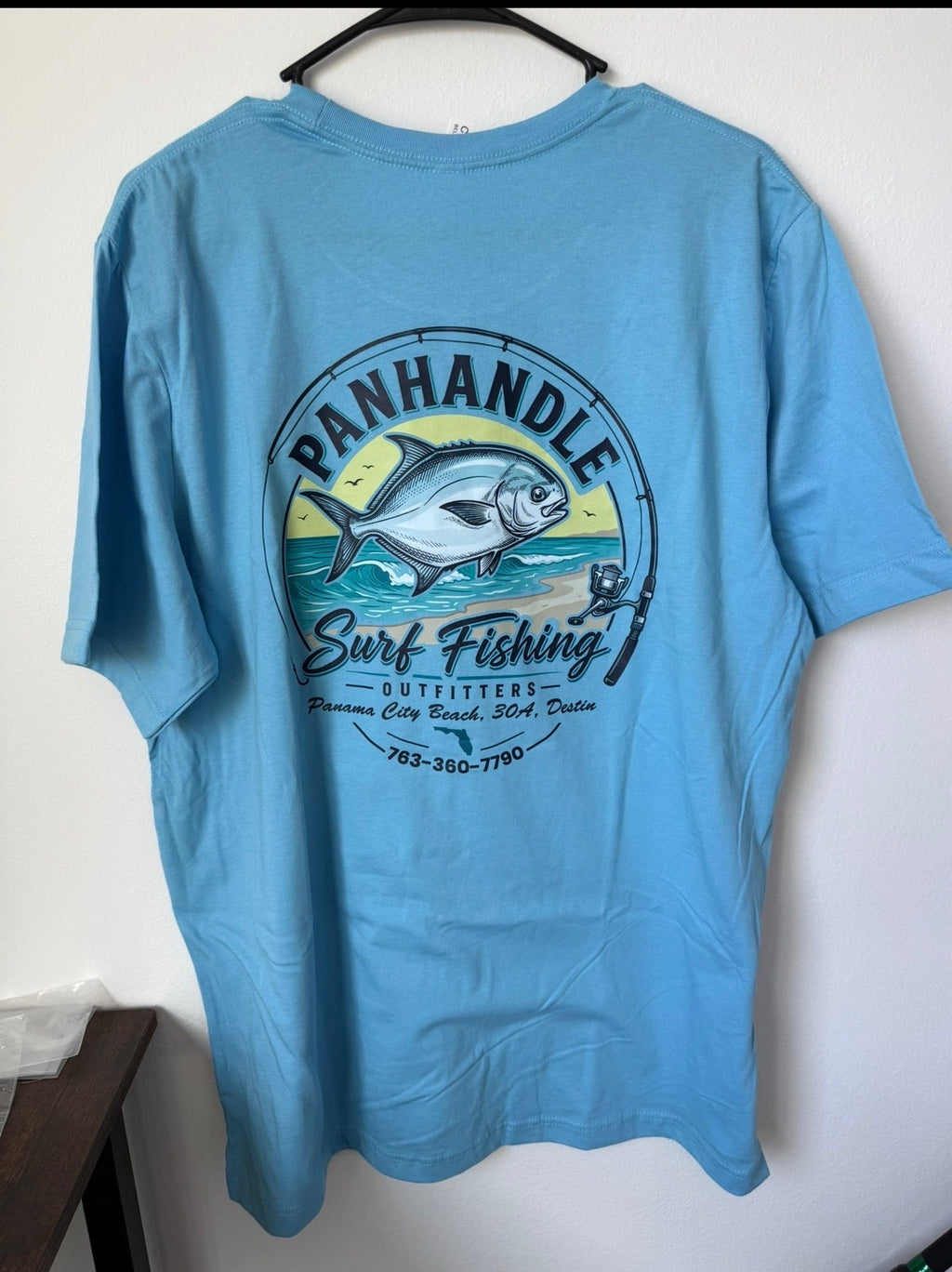 Panhandle Surf Fishing Outfitters light blue t-shirt with surf fishing graphic